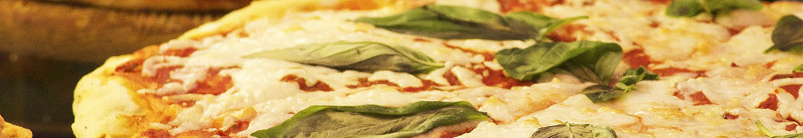 Eating Italian Pizza at Michelangelo's restaurant in Salem, OR.